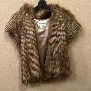 Fur vest with a hood